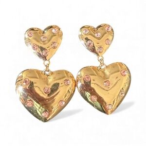 Gold tone heart earrings with pink crystals